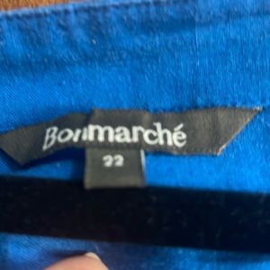 Two different short sleeve, summer tops, one plain blue and one striped